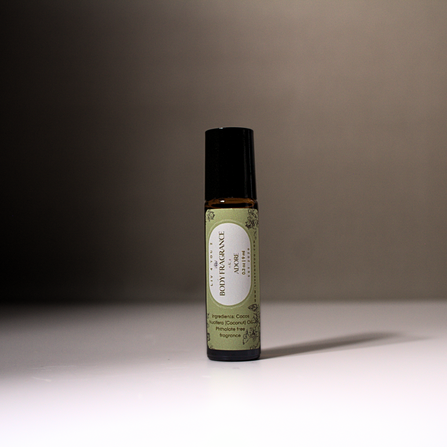 All Natural Roll On Body Perfume in brown glass, black top, green and white label for Liv 4 You 2