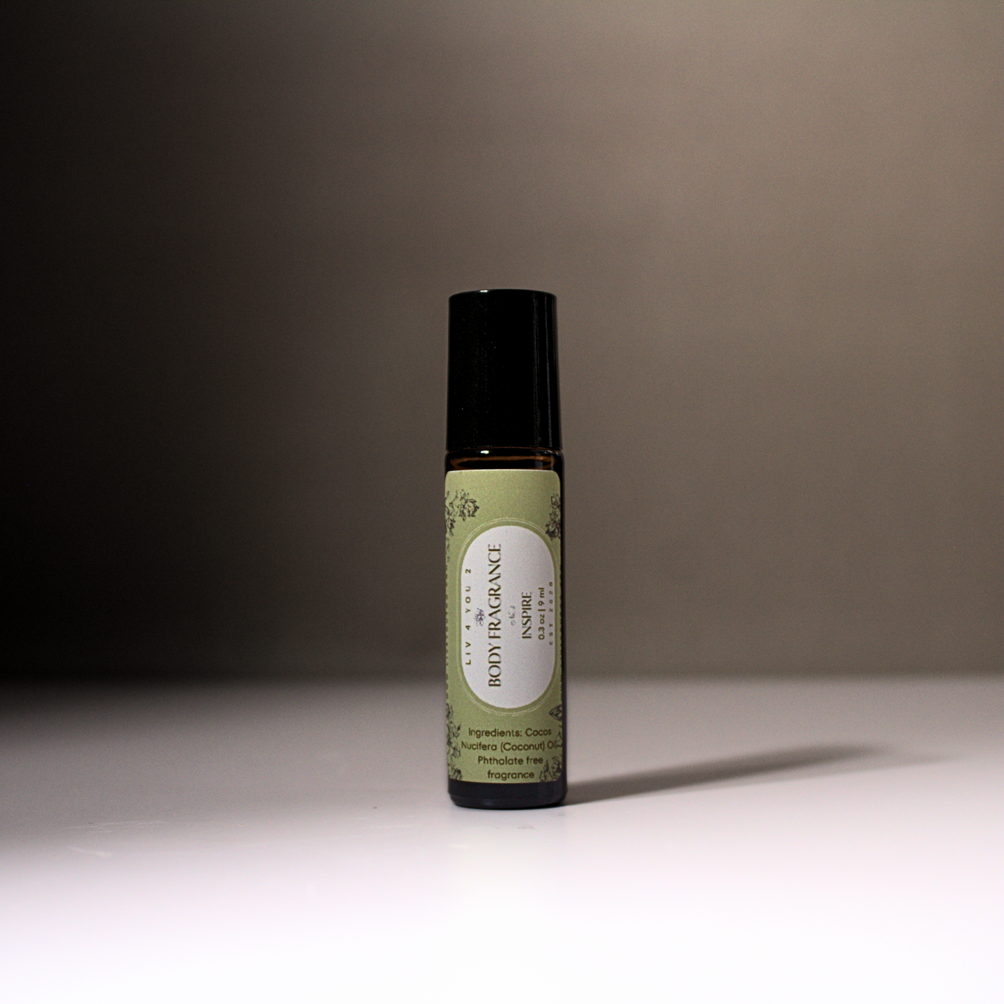 All Natural Roll On Body Perfume in brown glass, black top, green and white label for Liv 4 You 2
