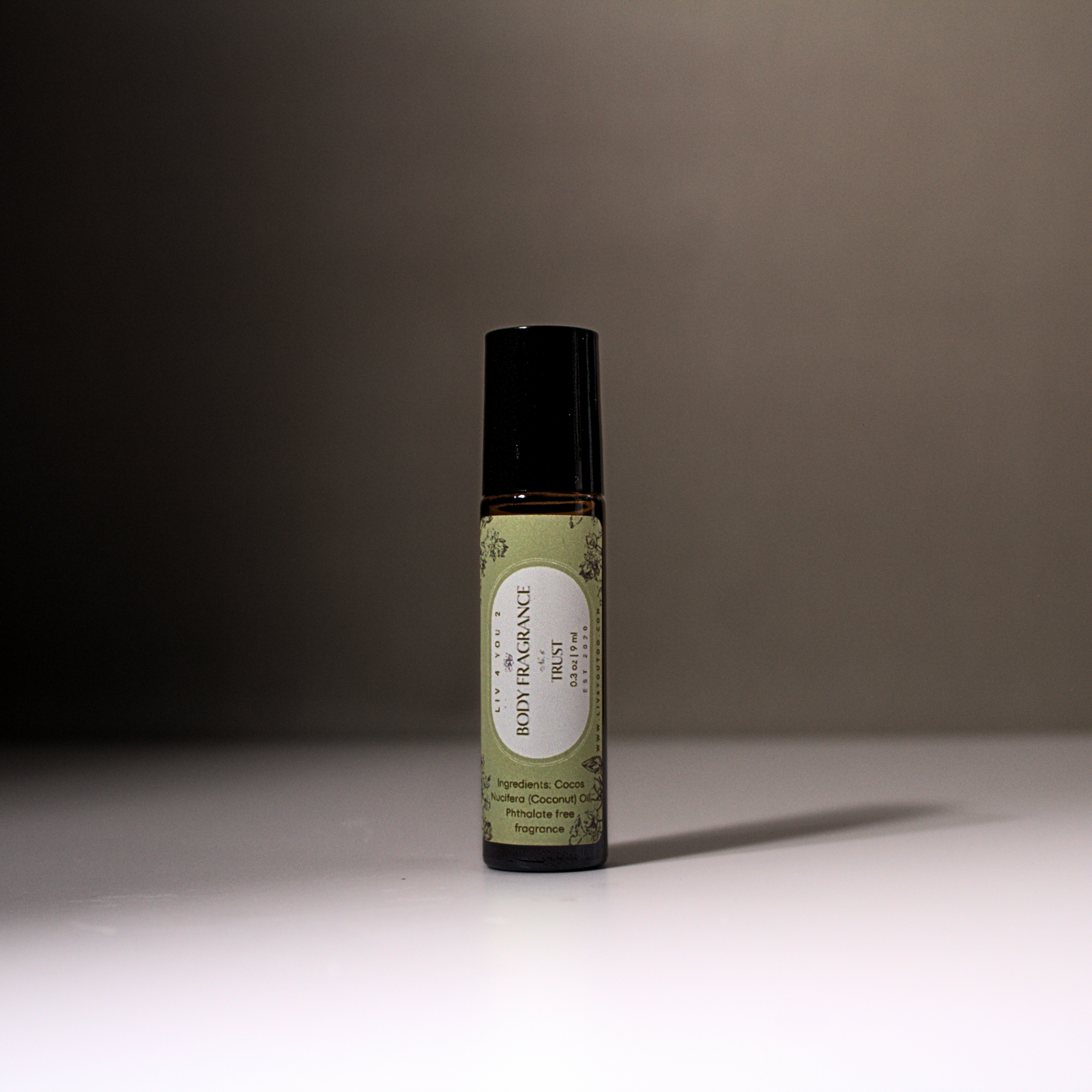 All Natural Roll On Body Perfume in brown glass, black top, green and white label for Liv 4 You 2