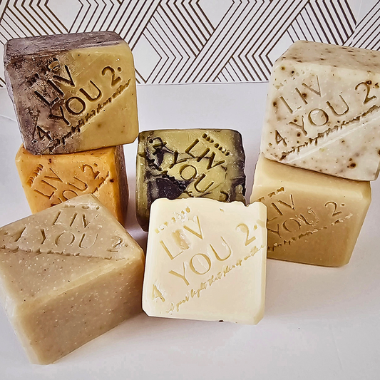 body soap collection for Liv 4 You 2 stamp on white background, 7 square bars of soap shown