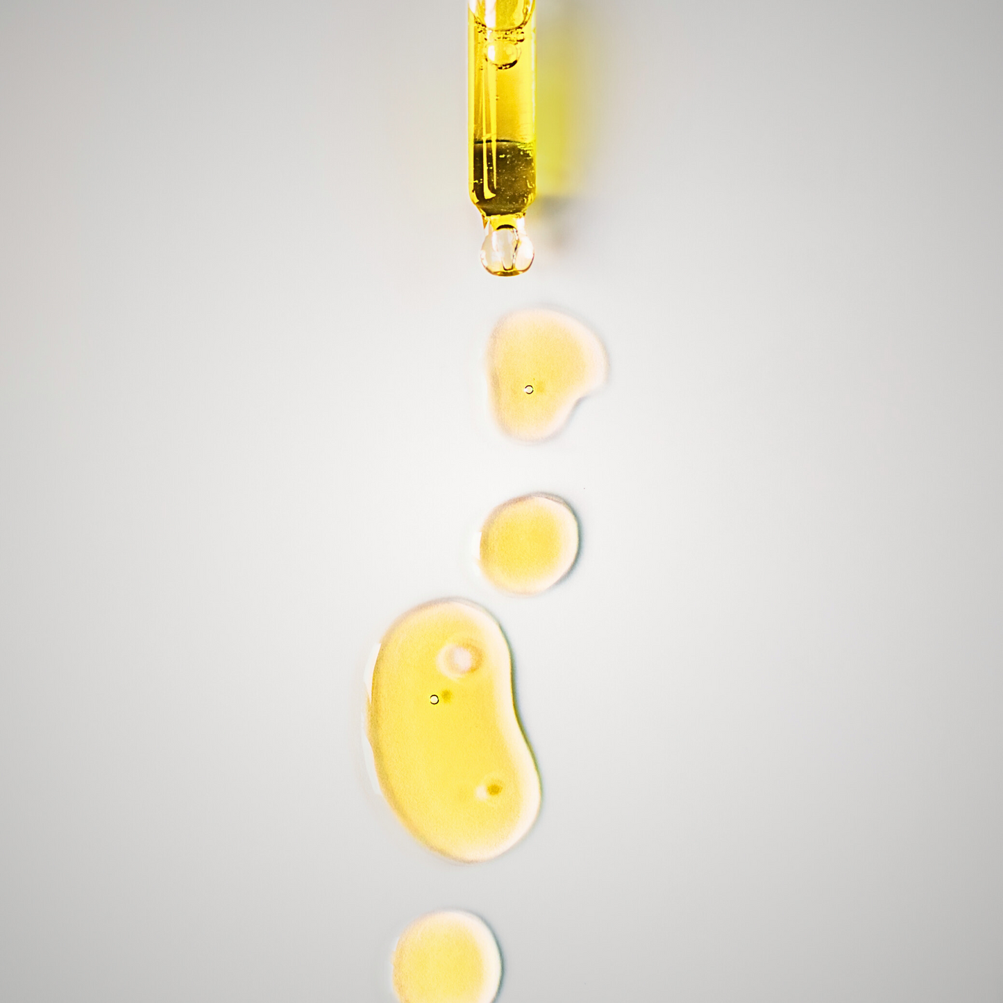 Hair and Scalp Oil droplets on white background Liv 4 You 2