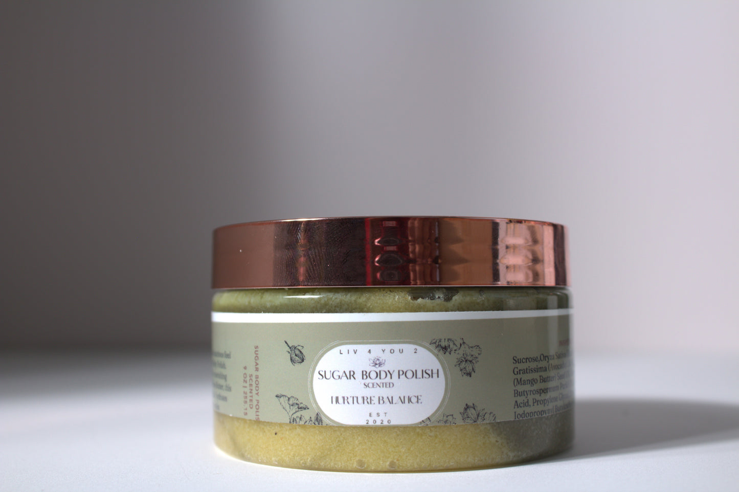 Sugar Body Polish Liv 4 You 2 Nurture Balance on white table with brown table