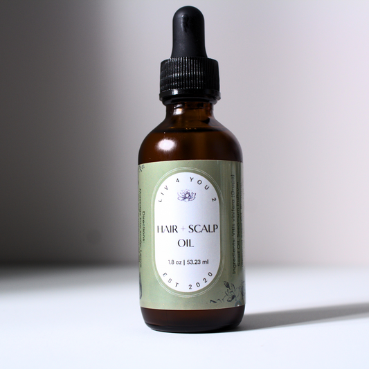 Hair and Scalp Oil Liv 4 You 2 in brown glass bottle with black dropper, green and white label with black writing.